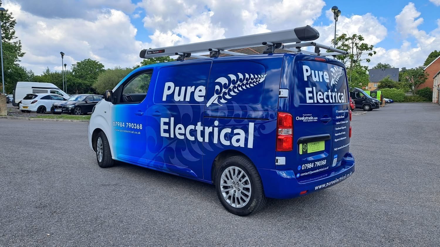 The Pure Electrical van — Checkatrade verified and out across Berkshire and Surrey.